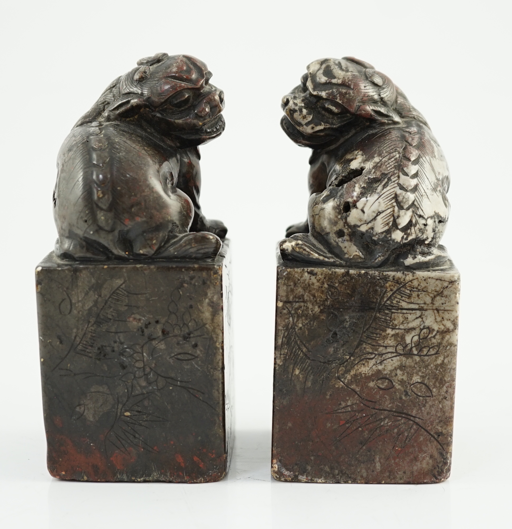 A pair of Chinese soapstone lion-dog seals, Qing dynasty